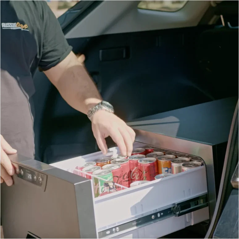 Rockarmor 31 litre vehicle draw fridge in black showing mounting brackets for outback traveller use in car trunk drawer