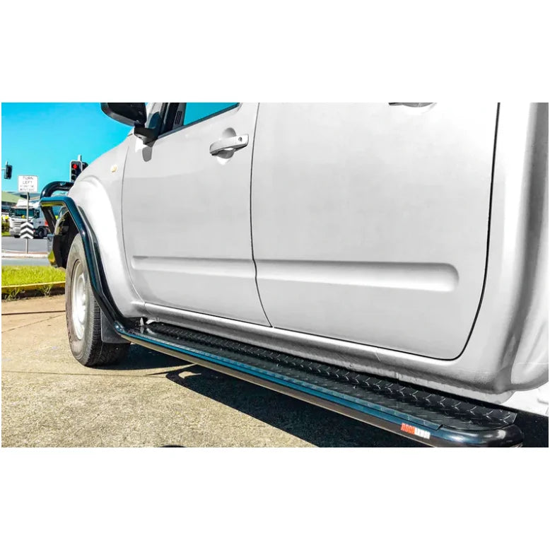 Silver pickup truck fitted with rockarmor rockslider brushbar in premium steel suit nissan navara d40 2005-2015