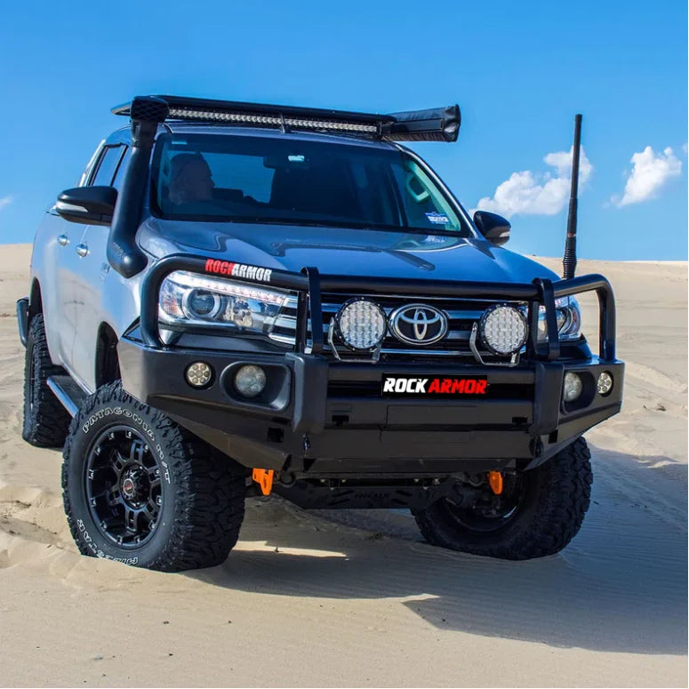Silver toyota hilux fitted with rockarmor elite bullbar frontal combo and synthetic winch rope for added protection