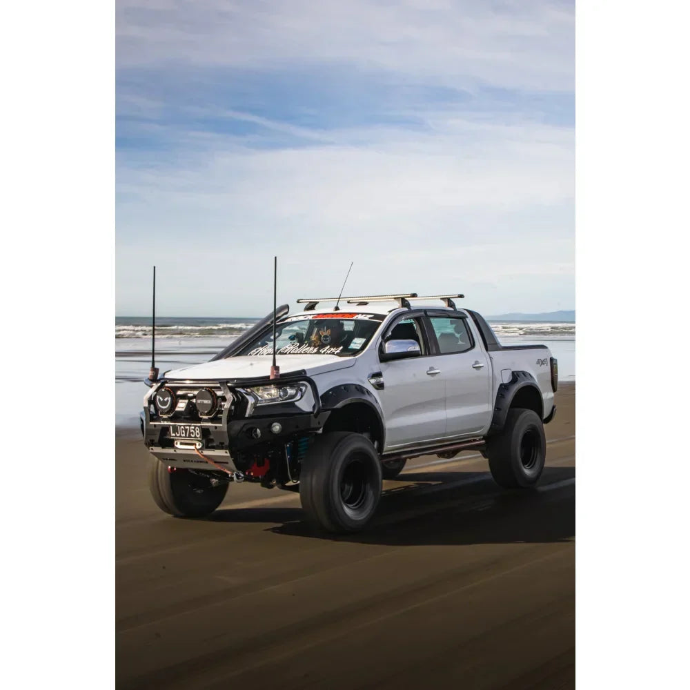 Modified white Ford Ranger PX2 pickup truck equipped with rockarmor gt steel hoop bullbar and synthetic winch rope combo pack