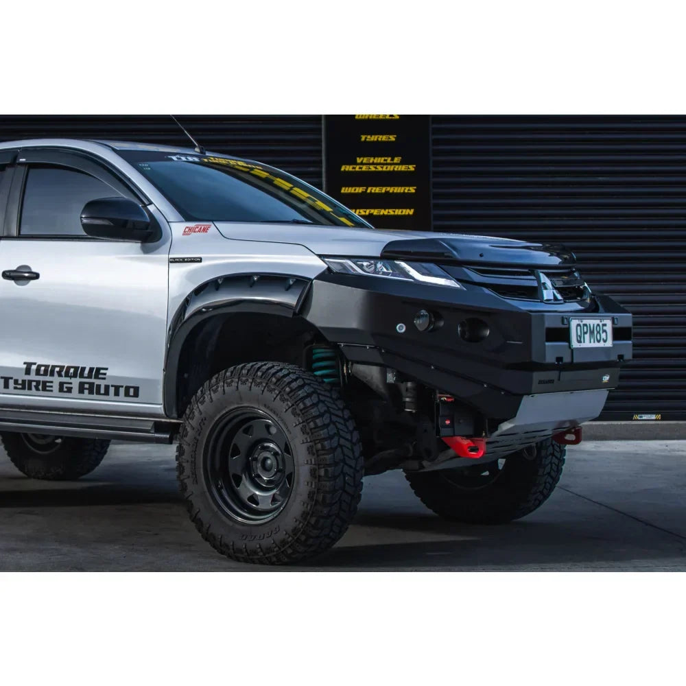 Silver Mitsubishi mr triton pickup truck equipped with Rockarmor gt steel hoopless bullbar combo pack with black front bumper