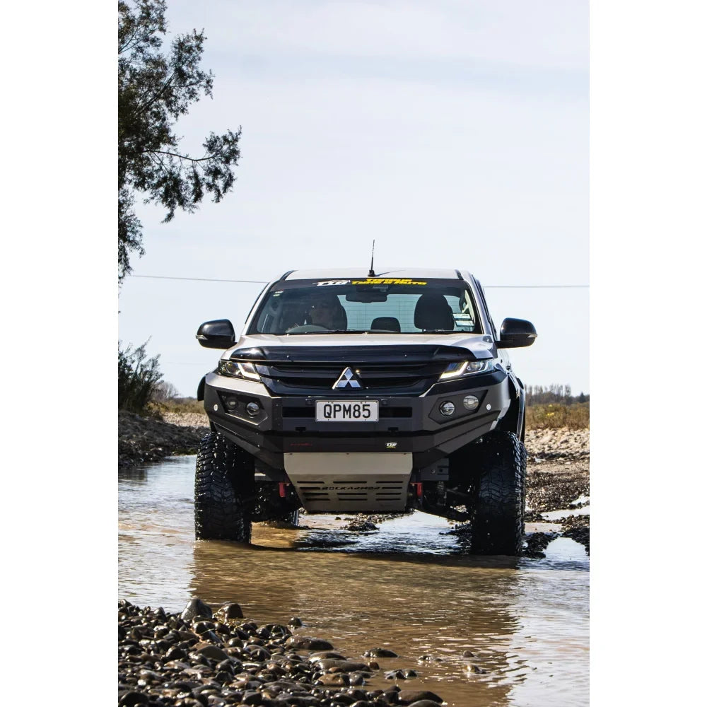 Black mitsubishi mr triton off-road truck equipped with rockarmor gt steel hoopless bullbar and synthetic winch rope combo pack