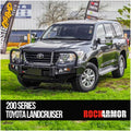 Gray Toyota Landcruiser equipped with rockarmor premium steel bullbar featuring fog lights and vehicle suspension suit Toyota