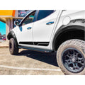 White pickup truck with black accents featuring rockarmor steel rockslider side steps for mitsubishi triton ml/mn dual cab