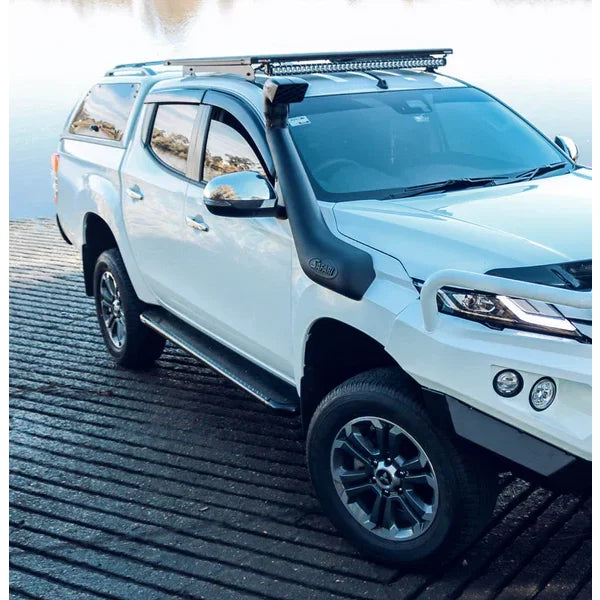 White mitsubishi triton with roof rack featuring rockarmor steel rockslider checker plate step on the side