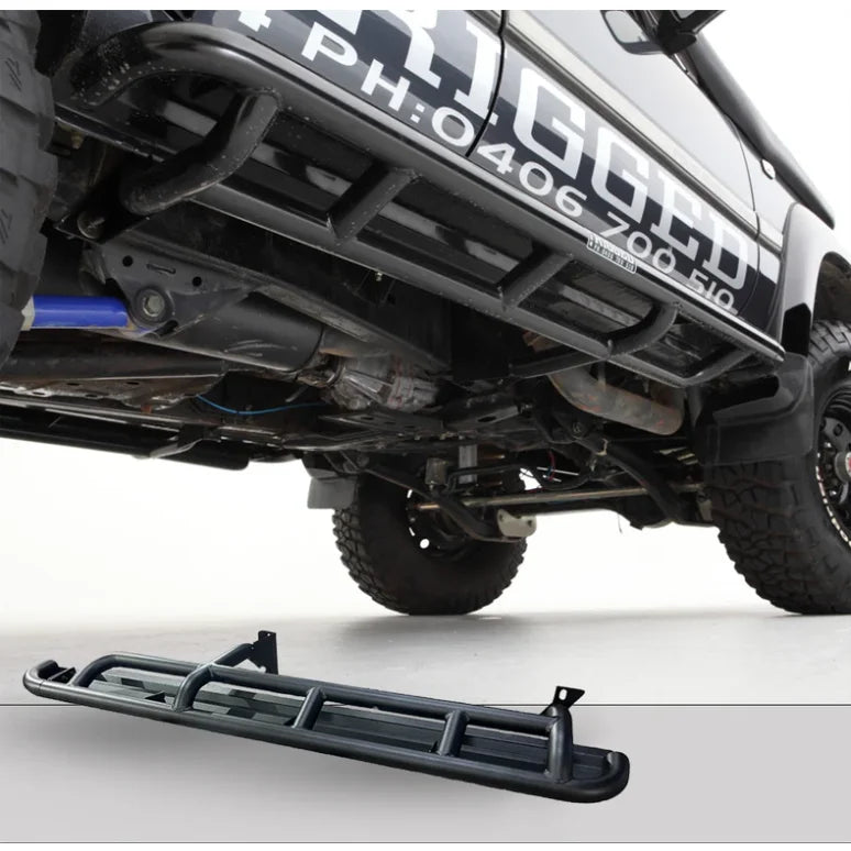 Black metal rockarmor steel rockslider side steps with checker plate step for Toyota Landcruiser Fj80 1990-1997 back side view