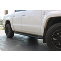 White pickup truck with rockarmor steel rockslider side steps in black suit vw amorok and brush bar compatible